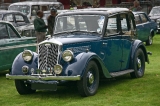  Wolseley 12/48 Series II.  In 1936 the -Series II- Wolseleys appeared with raked back screens and sloped grilles.  The 12/48 shared the 1548cc OHV engine and many chassis and mechanical parts with the Morris 12/4.
